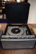 A vintage portable record player by ITT KB Model no. KP 1000