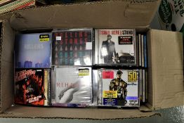 A lot of one hundred and thirty compact discs,rock,pop,dance and more.