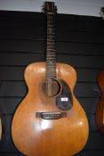 A Martin 000-18 acoustic guitar, serial number 149021, dater project lists as 1956 with Martin