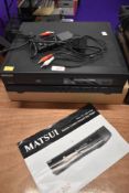 A Matsui CDP 200 compact disk cd player with instructions and remote