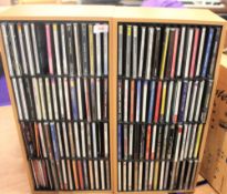Two compact disc units with Jazz related compact disc collection.