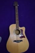 A Tanglewood TW15CE electro acoustic guitar, serial number 0305190146, and Thomann hard case