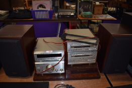 A Technics stackable amp tuner cassette and disk player