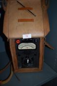 A vintage 'heavy duty avometer' multimeter in leather case.