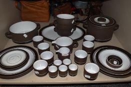 An assortment of Hornsea pottery contrast plates,cups,tureens, bowls and plates.around thirty