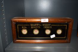 A wooden cased calling/summoning box or similar, BEA,quantity surveyor,resident engineer.