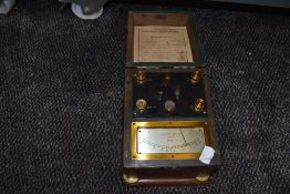 An Eversheds Ohmmeter portable testing kit in Mahogany case.