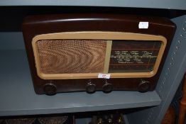 A 1950s early plastic Cossor melody maker 501A.C. Valve radio.