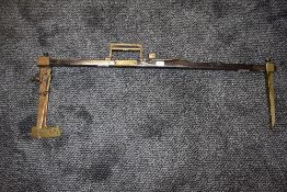 An early mechanics or engineers wheel balance or gauge the 3 way system Feragen