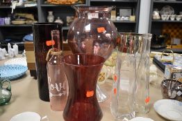 A selection of coloured glass vases and similar