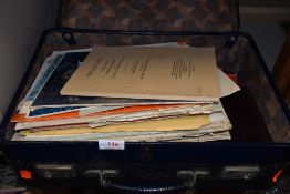 A suitcase containing sheet music, play sheets,English literature adaptations and similar ephemera.