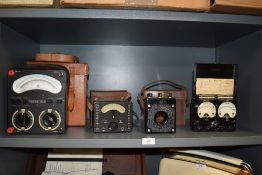 A collection of electrical equipment including Avometer 8 and universal Avominor and similar.
