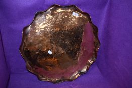 An arts and crafts copper tray having embossed decoration