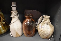 A selection of studio pottery lamp bases including signed pieces and slate sculpture
