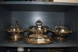 A selection of silver plated lidded serving dishes and tureen some marked TF