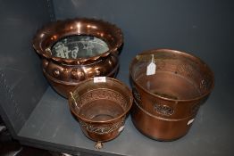 A selection of copper planters including large decorative Joseph Sankey