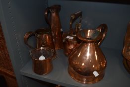 A selection of copper vessels including Joseph Sankey jug