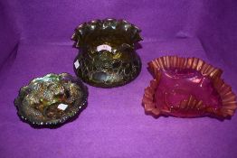 A selection of fine glass wares including Loetz iridescenct green bowl, similar bowl and cranberry