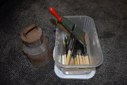A selection of kitchen wares including cutlery and dairy can