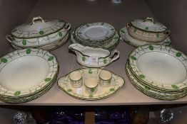 A Part Royal Doulton Countess dinner service,plates, tureens and egg cups included.around twenty