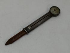 An Edwardian silver pencil and map rota meter map measurer by Asprey of London having retracting