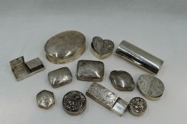 Twelve white metal patch boxes stamped 925 of assorted forms and decoration including engraved,