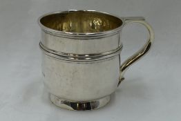 A silver christening mug having reeded decoration and inscribed Eric 1919, Birmingham 1920, Deakin &