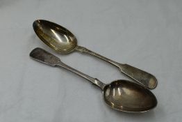 A pair of Scottish Victorian silver table spoons of fiddle back form bearing monogram H to