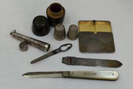 A selection of HM silver items including a cigarette holder case, an Edwardian bookmark having