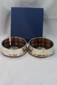 A pair of modern silver bottle coasters of plain form, Sheffield 2008/09, Carrs of Sheffield Ltd,