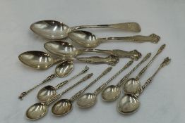 A selection of white metal and HM silver spoons of assorted forms including Dutch Apostle spoons,