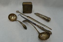 A small selection of HM silver including ladle, sifting spoon, paper knife, silver backed