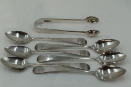 A set of six Georgian silver teaspoons of old English form bearing monogram to terminals, London