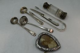 A selection of HM silver including two Georgian silver salt spoons, sugar caster spoon and sugar