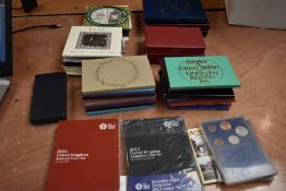 A large collection of UK Uncirculated and Brilliant Uncirculated Year Coin Sets