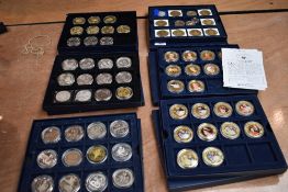 A collection of mainly Crown Size Coins in 6 trays, some maybe Silver, no certificates