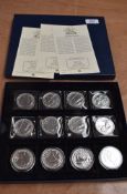 A collection of 12 GB 1oz Fine Silver Britannia 2 Pound Coins in tray, 2013 x4, 2014 x4 and 2015 x4