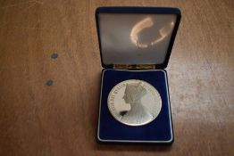 A large White Metal Proof like Medalion, Young Victoria on one side, Coat of Arms on reverse