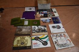 A collection of UK Uncirculated and Brilliant Uncirculated Coins, 2010 set, 1 Pound, 2 Pound and 5