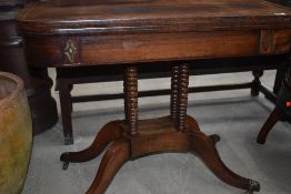 A Regency Rosewood fold over card table