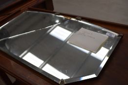 A vintage wall mirror (af) width approx. 56cm