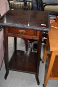 A late Victorian, square top occasional table, the frieze drawer having Aesthetic brass handle ,