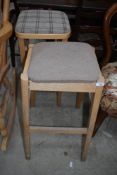 Two modern bar style kitchen stools