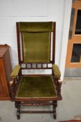 A Victorian stained frame American rocker chair
