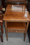A pair of reproduction light mahogany and inlaid bedside or occasional tables