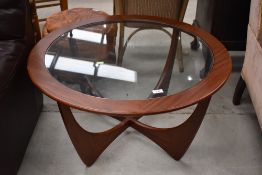 A vintage sapele and glass circular coffee table, diameter approx. 84cm