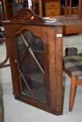 A 19th Century oak corner wall display cabinet