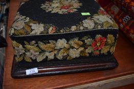 A Victorian mahogany and tapestry work footstool