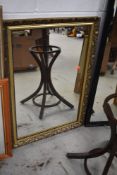 A modern gilt frame wall mirror, approx. 86 x 60cm