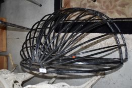 A pair of wall hanging hay racks, make ideal garden baskets